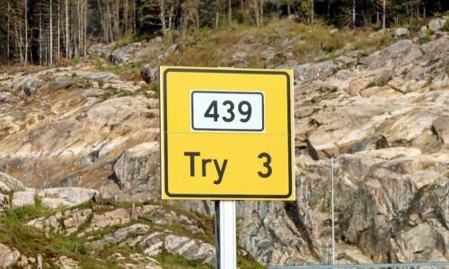 a yellow sign that says try 3 on it