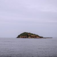 a small island in the middle of the ocean