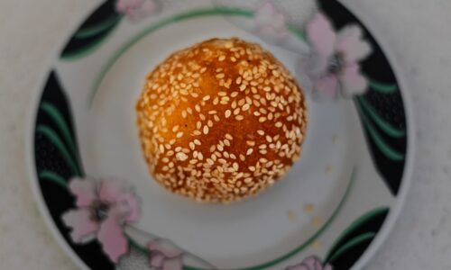 yellow and white round cake on white ceramic plate